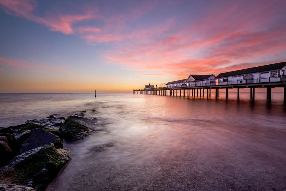 A colourful sunrise and long exposyre at Southwold Pier in Suffolk, UK.