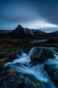 Tryfan in Snowdonia, North Wales, at blue hour with light trails