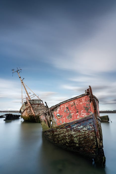 Long exposure of derelict boats at Pin Mill shot with the Sony FE 20mm f/1.8
